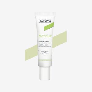 BB Crème Noreva Actipur teinte clair, soin matifiant qui unifie le teint et réduit les imperfections, adaptée aux peaux grasses et sensibles, disponible en parapharmacie à Kénitra et parapharmacie en ligne.